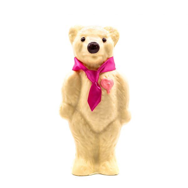 white chocolate bear with a pink tie and heart