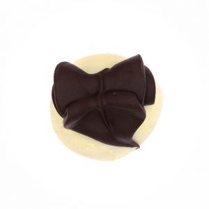 white chocolate truffle with dark chocolate florish with cherry flavored interior