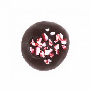crushed peppermint candy topping a peppermint infused chocolate truffle