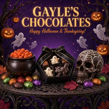 Gayle’s Chocolates Halloween and Thanksgiving gift box with ghost chocolates, chocolate skull, cauldron of orange candies, and autumn leaves